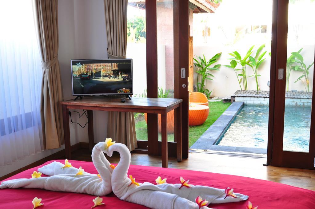 Si Doi Hotel Legian Кута Стая снимка