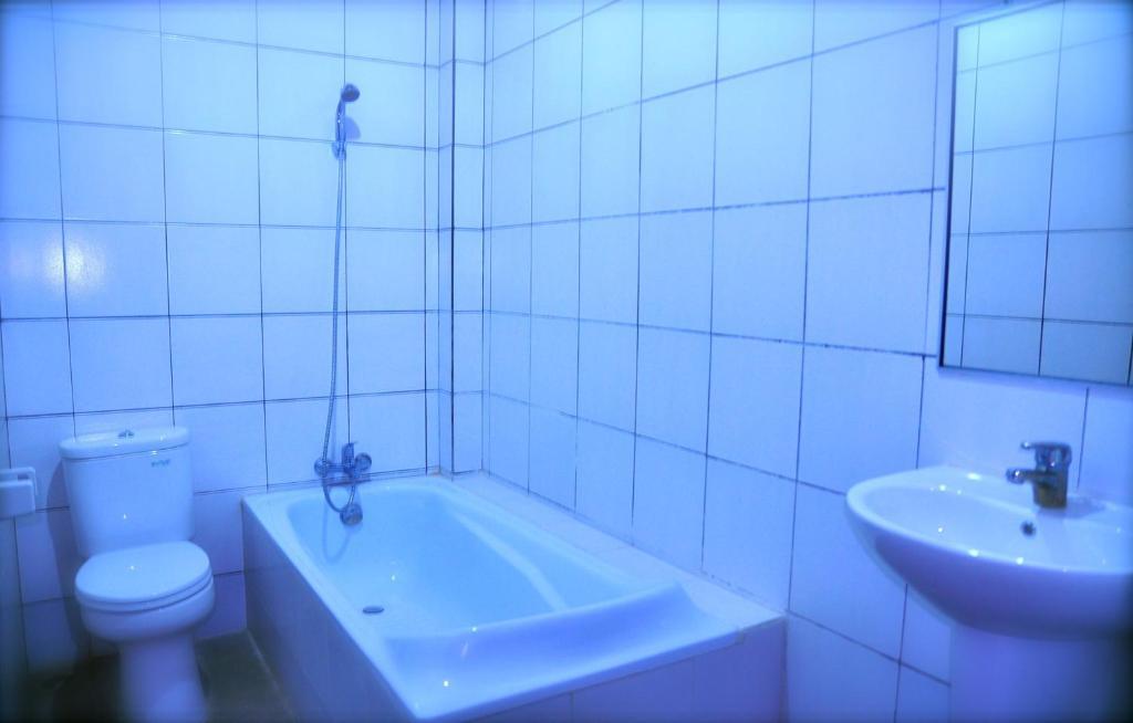 Si Doi Hotel Legian Кута Стая снимка